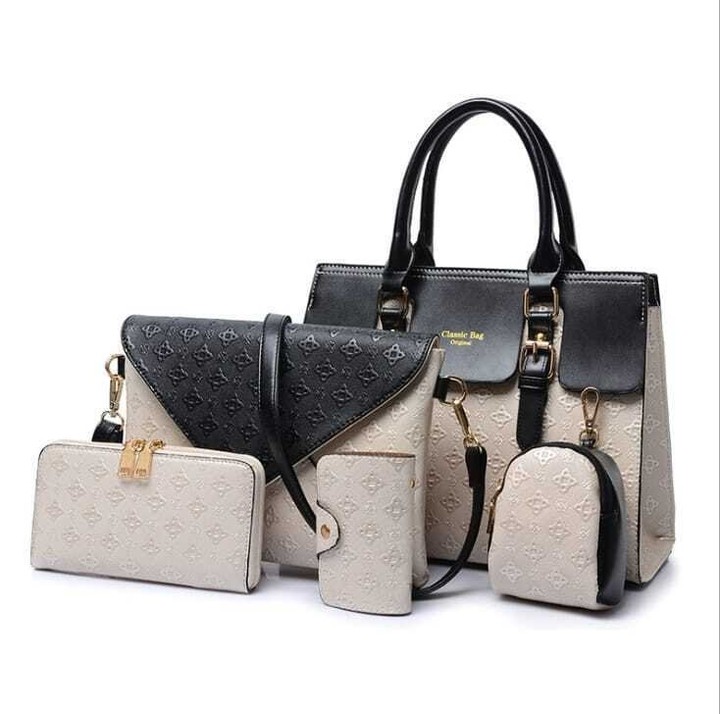 Full‑Grain Black Leather Handbag Set – Tote, Crossbody & Clutch for All‑Day Organization – Shopdecimals
 Product Information:fabric texture PU – lining texture, polyesterLuggage shape, cross-sectionLuggage trend style Opening methodPopular elementsInternal structure of the bag Zip pocket, cell phone pocket, ID bag, laminated zip pocketColor: black, black with white, black with gold, black with bluePackage List: Handbag *1, Purse*2, Wallets *2 

Stay organized and stylish with a coordinated set of black luxury leather handbags that transition seamlessly from day to night. Crafted from full-grain leather, each piece offers lasting durability and a refined silhouette, prompting you to explore the full collection.

https://shopdecimals.com.ng/a-set-of-luxury-leather-handbags-black-shopdecimals/