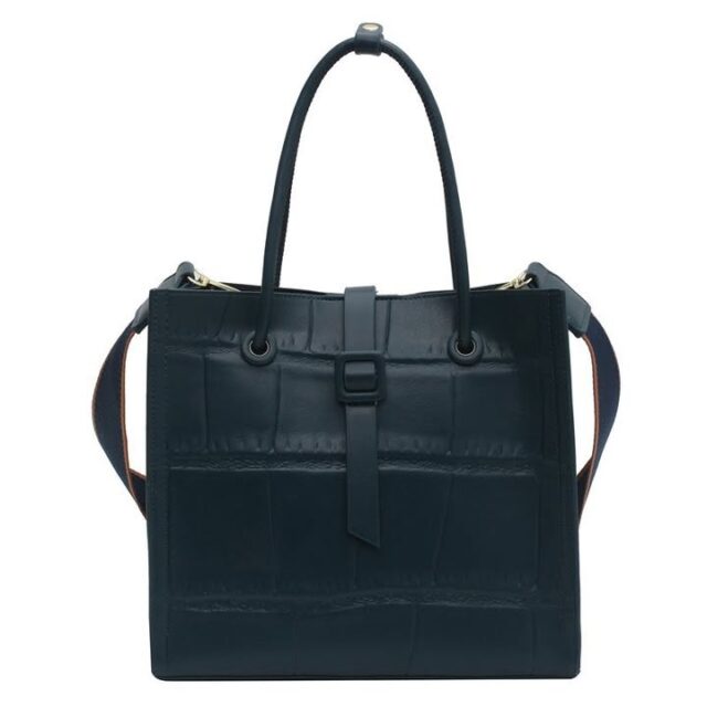 Carry All Day Lightly: Large‑Capacity PU Tote with Magnetic Closure – 0.58 kg, Fits 15‑inch Laptop – Shop Decimals
Product information:Style: Women's handbagFabric texture: PULining texture: synthetic leatherBag shape: vertical squareTrend of luggage: Tote BagCover opening mode: magnetic bucklePopular element: embossingInterior structure: zipper pocketLifting part: soft handleType of outer bag: stereo bagColor: khaki, blue, black, coffee, greyWidth: 26 Height: 23.5 Thickness: 10Packing list:Bag*1

Carry everything you need without strain, thanks to a roomy 260 cm by 235 cm interior that fits laptops, groceries, and gym gear in one sleek tote. At just 0.58 kg, the bag stays light on your shoulder, making daily errands effortless. Discover how its PU texture and five color options blend durability with style.

https://shopdecimals.com.ng/pu-texture-portable-simple-large-capacity-tote-bag/