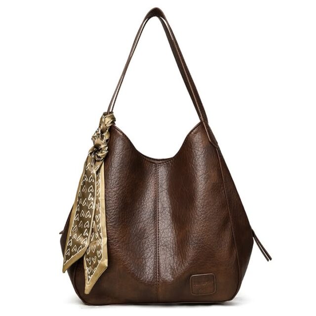 Women's Retro Tote Large-Capacity Tote Bag | ShopDecimals
Product Information:Product Overview: This women's fashion backpack features a vintage tote design with an eclectic aesthetic, ideal for casual and travel occasions. Crafted from high-quality PU material, it offers a medium-soft touch that balances durability and comfort.Product Specifications: Material: Outer PU, Inner Polyester Fiber Style: Eclectic Aesthetic, Vintage Fashion Color: Dark Brown, Off-White, Gray, Black, Tan Structure: Horizontal rectangular shape with top splicing detail; includes a single shoulder strap for hand-carry, crossbody, or shoulder wear Interior: Equipped with a zippered compartment pocket and an inner slip pocket for organized storagePackage List:  1 * Women's Fashion Backpack

https://shopdecimals.com.ng/womens-retro-tote-large-capacity-tote-bag-shopdecimals/